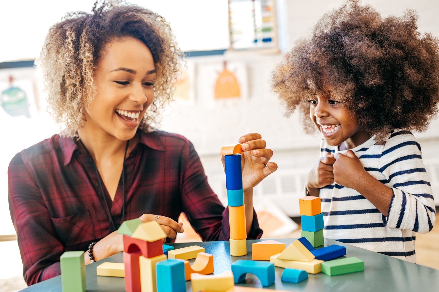 Speech therapist on session with toddler